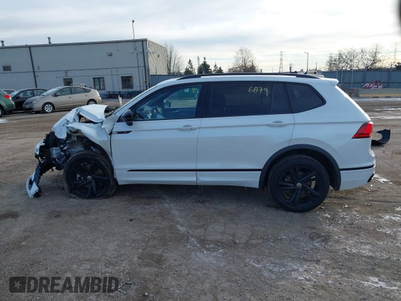 2023 Volkswagen Tiguan SE R-Line Black with VIN 3VV8B7AX9PM086225, listed as a IAAI auction lot 41276879 with Not provided miles and . Bid and sale history available at DreamBid. Image 14.