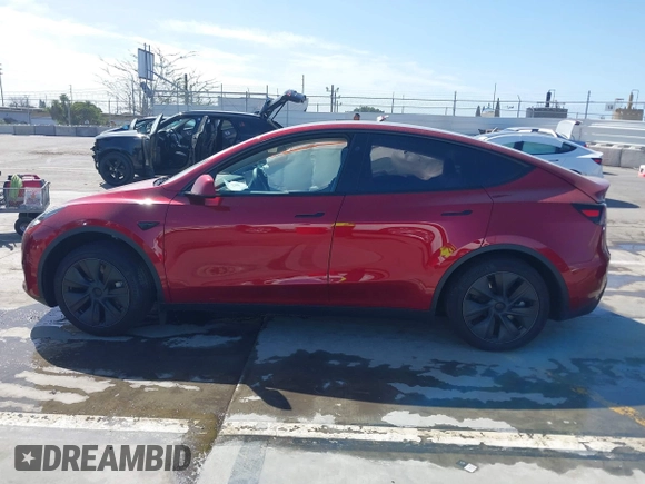 2024 Tesla Model Y Long Range with VIN 7SAYGDEE6RF190947, listed as a IAAI auction lot 41808973 with 2,457 mi miles. Bid and sale history available at carsss.com. Image 14.
