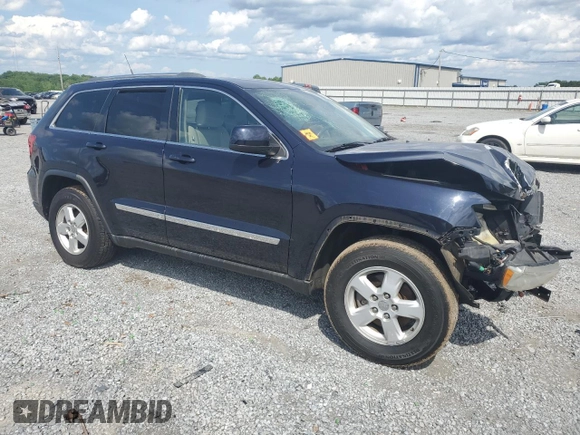 2011 Jeep Grand Cherokee Laredo with VIN 1J4RR4GG7BC515001, listed as a Copart auction lot 56432905 with 143,181 mi miles and Salvage title. Bid and sale history available at DreamBid. Image 4.