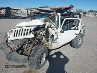 2010 Jeep Wrangler Mountain with VIN 1J4AA2D14AL173286, listed as a IAAI auction lot 41661821 with Not Provided miles and . Bid and sale history available at carsss.com. Image 2.