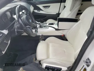 2016 BMW M6 z VIN WBS6E9C55GGF92676, wystawiony jako Copart lot #77663924 z przebiegiem 36 548 mil mil oraz Szkoda całkowita • Salvage title. Historia ofert i sprzedaży dostępna na DreamBid. Obrazek 7.