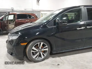 2024 Honda Odyssey Touring z VIN 5FNRL6H80RB044915, wystawiony jako IAAI lot #41921539 z przebiegiem 13 425 mil mil oraz . Historia ofert i sprzedaży dostępna na DreamBid. Obrazek 19.