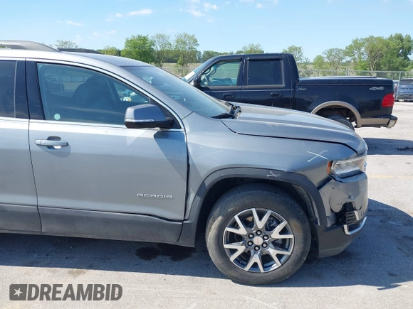 2023 GMC Acadia SLT with VIN 1GKKNML46PZ130813, listed as a IAAI auction lot 42614040 with 56,086 mi miles and . Bid and sale history available at DreamBid. Image 17.