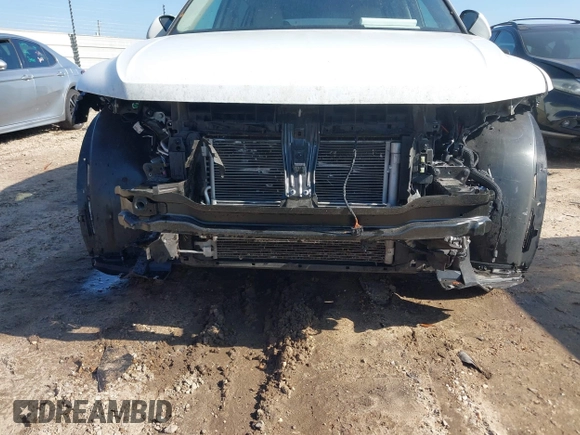 2023 Volkswagen Tiguan S z VIN 3VVRB7AX7PM076426, wystawiony jako IAAI lot #41453269 z przebiegiem 63 478 mil mil oraz . Historia ofert i sprzedaży dostępna na DreamBid. Obrazek 6.