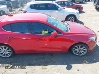 2014 Mazda 3 S Touring with VIN JM1BM1L36E1139818, listed as a IAAI auction lot 42052687 with 134,397 mi miles and . Bid and sale history available at DreamBid. Image 13.