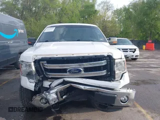 2014 Ford F-150 XL with VIN 1FTFW1EFXEKE92754, listed as a IAAI auction lot 42109551 with 219,130 mi miles. Bid and sale history available at carsss.com. Image 13.