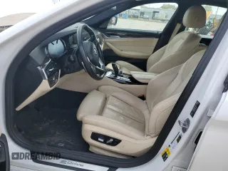 2018 BMW 5 Series 530e xDrive with VIN WBAJB1C58JB084907, listed as a Copart auction lot 49901795 with 109,617 mi miles and Salvage title. Bid and sale history available at DreamBid. Image 7.