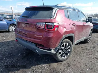 2020 Jeep Compass Trailhawk with VIN 3C4NJDDB2LT239384, listed as a IAAI auction lot 41527372 with 56,122 mi miles and . Bid and sale history available at carsss.com. Image 6.