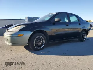 2000 Ford Focus LX with VIN 1FAFP33P8YW216936, listed as a Copart auction lot 83038404 with 120,298 mi miles and Salvage Title. Bid and sale history available at DreamBid. Image 1.