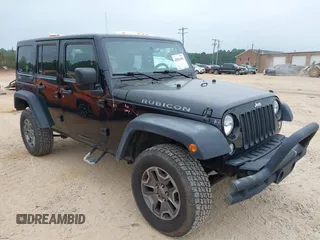 2015 Jeep Wrangler Unlimited Rubicon with VIN 1C4BJWFG7FL688728, listed as a IAAI auction lot 42054304 with 100,152 mi miles and . Bid and sale history available at DreamBid. Image 1.