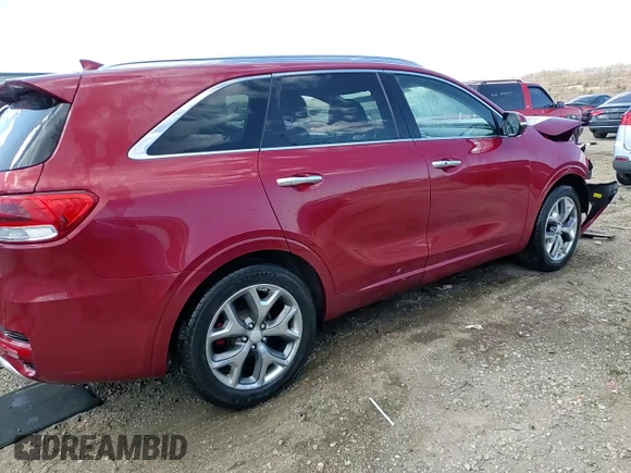 2017 Kia Sorento SX z VIN 5XYPK4A59HG225887, wystawiony jako Copart lot #50325005 z przebiegiem 122 419 mil mil oraz Szkoda całkowita • Salvage title. Historia ofert i sprzedaży dostępna na DreamBid. Obrazek 14.
