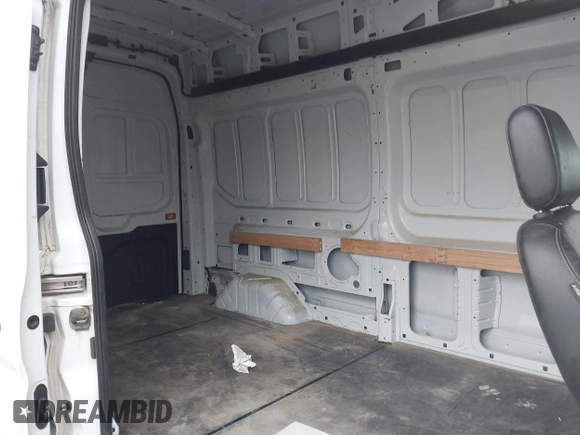 2021 Ford Transit Cargo with VIN 1FTBW1X84MKA98047, listed as a IAAI auction lot 42313747 with 65,600 mi miles and . Bid and sale history available at DreamBid. Image 8.