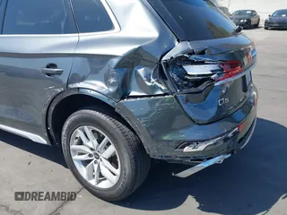 2022 Audi Q5 S line Premium z VIN WA1GAAFY3N2088773, wystawiony jako IAAI lot #41969990 z przebiegiem 22 922 mil mil oraz . Historia ofert i sprzedaży dostępna na DreamBid. Obrazek 12.