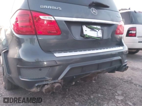2014 Mercedes-Benz GL-Class GL 550 with VIN 4JGDF7DE9EA329761, listed as a IAAI auction lot 41651533 with 113,056 mi miles. Bid and sale history available at carsss.com. Image 19.