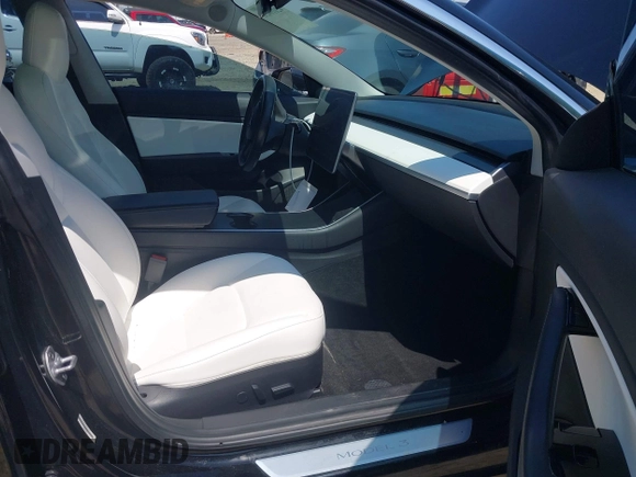 2018 Tesla Model 3 Long Range Battery with VIN 5YJ3E1EB1JF122786, listed as a IAAI auction lot 42010451 with 85,510 mi miles and . Bid and sale history available at DreamBid. Image 5.