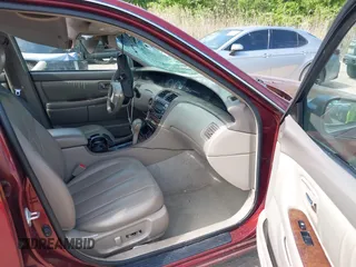 2001 Toyota Avalon XL z VIN 4T1BF28B61U144974, wystawiony jako IAAI lot #42112377 z przebiegiem 168 311 mil mil oraz . Historia ofert i sprzedaży dostępna na DreamBid. Obrazek 5.