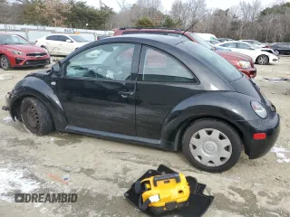 1999 Volkswagen Beetle GLS with VIN 3VWCC21C6XM401937, listed as a Copart auction lot 41978455 with 223,461 mi miles and Salvage title. Bid and sale history available at DreamBid. Image 2.