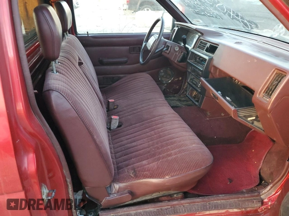 1993 Nissan Frontier z VIN 1N6SD11S0PC332903, wystawiony jako Copart lot #84039484 z przebiegiem 136 324 mil mil oraz Szkoda całkowita • Salvage title. Historia ofert i sprzedaży dostępna na DreamBid. Obrazek 10.