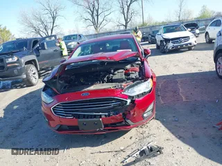 2019 Ford Fusion SE with VIN 3FA6P0HD1KR166565, listed as a IAAI auction lot 41961294 with 99,355 mi miles. Bid and sale history available at carsss.com. Image 6.