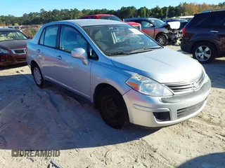 2011 Nissan Versa S with VIN 3N1BC1AP3BL450476, listed as a IAAI auction lot 40925098 with 158,922 mi miles and . Bid and sale history available at DreamBid. Image 1.