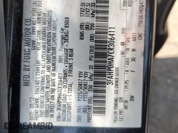 2012 Ford Fusion SE z VIN 3FAHP0HA7CR306411, wystawiony jako Copart lot #60476635 z przebiegiem 173 779 mil mil oraz Szkoda całkowita • Salvage title. Historia ofert i sprzedaży dostępna na DreamBid. Obrazek 12.