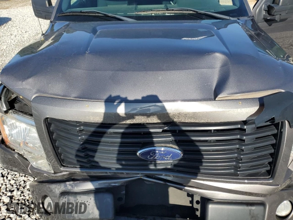 2014 Ford F-150 XL с VIN 1FTFX1CF5EFB56079, выставлен на аукционе Copart как лот 57345505 с пробегом 159 774 миль миль и Списание • Salvage title. История ставок и продаж доступна на DreamBid. Изображение 11.
