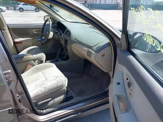1999 Oldsmobile Intrigue GX z VIN 1G3WH52K5XF334949, wystawiony jako IAAI lot #42252647 z przebiegiem 80 705 mil mil oraz . Historia ofert i sprzedaży dostępna na DreamBid. Obrazek 5.