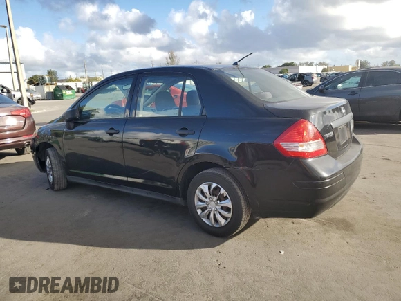 2010 Nissan Versa 1.6 with VIN 3N1CC1AP0AL366599, listed as a Copart auction lot 44592695 with 184,527 mi miles and Salvage Title. Bid and sale history available at carsss.com. Image 2.