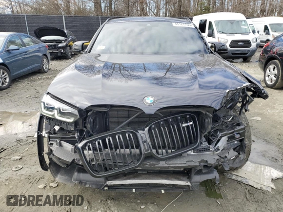 2023 BMW X4 M with VIN 5YM23EC03P9S24918, listed as a Copart auction lot 45127705 with 9,817 mi miles and Salvage Title. Bid and sale history available at carsss.com. Image 5.