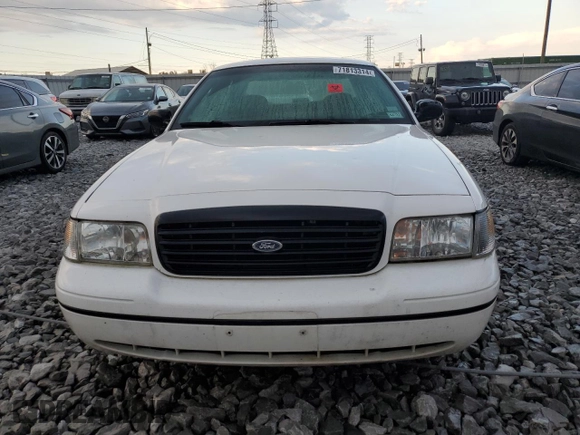 1999 Ford Crown Victoria Police z VIN 2FAFP71W4XX178478, wystawiony jako Copart lot #71813314 z przebiegiem 207 956 mil mil oraz Szkody całkowita. Historia ofert i sprzedaży dostępna na DreamBid. Obrazek 5.