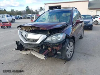 2010 Acura RDX Tech Pkg with VIN 5J8TB1H57AA001303, listed as a IAAI auction lot 41260059 with 217,546 mi miles. Bid and sale history available at carsss.com. Image 6.