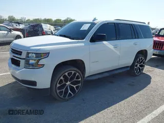 2015 Chevrolet Tahoe LT with VIN 1GNSCBKCXFR552071, listed as a IAAI auction lot 41972157 with 214,738 mi miles and . Bid and sale history available at DreamBid. Image 18.