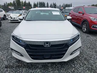2020 Honda Accord with VIN 1HGCV3F11LA002209, listed as a IAAI auction lot 40547166 with 102,938 mi miles and . Bid and sale history available at DreamBid. Image 12.