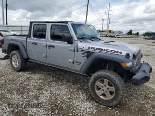 2020 Jeep Gladiator Rubicon z VIN 1C6JJTBG7LL102712, wystawiony jako Copart lot #60887965 z przebiegiem 80 262 mil mil oraz Szkoda całkowita • Salvage title. Historia ofert i sprzedaży dostępna na DreamBid. Obrazek 4.