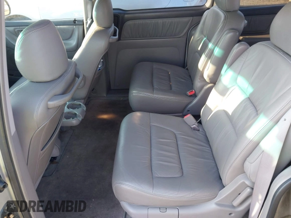 2004 Honda Odyssey EX-L with VIN 5FNRL18964B025323, listed as a IAAI auction lot 40714457 with 164,786 mi miles and . Bid and sale history available at DreamBid. Image 8.