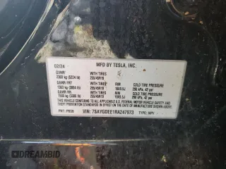 2024 Tesla Model Y Long Range z VIN 7SAYGDEE1RA247973, wystawiony jako Copart lot #45679205 z przebiegiem 22 739 mil mil oraz Szkoda całkowita • Salvage title. Historia ofert i sprzedaży dostępna na DreamBid. Obrazek 14.