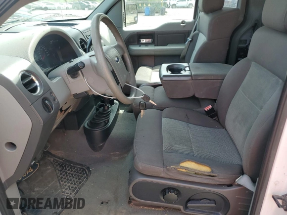 2004 Ford F-150 XL with VIN 1FTRF14574NB59432, listed as a Copart auction lot 55273405 with 145,271 mi miles and Clean Title. Bid and sale history available at DreamBid. Image 7.