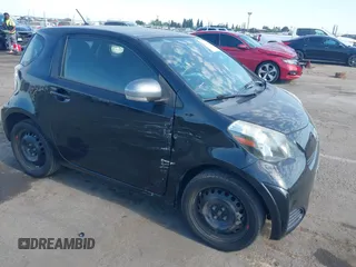 2013 Scion iQ with VIN JTNJJXB04DJ024322, listed as a IAAI auction lot 42618525 with 154,559 mi miles and . Bid and sale history available at DreamBid. Image 6.
