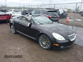 2004 Lexus SC with VIN JTHFN48Y040057283, listed as a IAAI auction lot 41961129 with 162,736 mi miles. Bid and sale history available at carsss.com. Image 1.