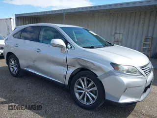 2015 Lexus RX 450h with VIN 2T2ZB1BA4FC002602, listed as a IAAI auction lot 41812562 with 166,220 mi miles and . Bid and sale history available at DreamBid. Image 1.
