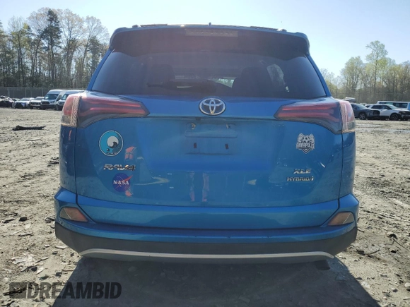 2016 Toyota RAV4 Hybrid XLE with VIN JTMRJREV4GD003211, listed as a Copart auction lot 52111305 with 79,404 mi miles and Salvage Title. Bid and sale history available at carsss.com. Image 6.