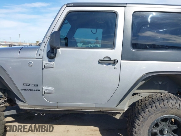 2014 Jeep Wrangler Sport with VIN 1C4AJWAG5EL206565, listed as a IAAI auction lot 42015000 with 90,129 mi miles and . Bid and sale history available at carsss.com. Image 14.