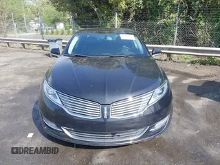 2015 Lincoln MKZ z VIN 3LN6L2G90FR602404, wystawiony jako IAAI lot #41946181 z przebiegiem 146 588 mil mil oraz . Historia ofert i sprzedaży dostępna na DreamBid. Obrazek 12.