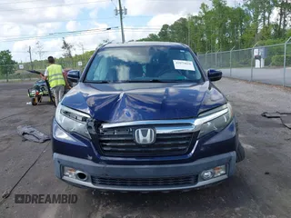2019 Honda Ridgeline RTL-E with VIN 5FPYK3F76KB010613, listed as a IAAI auction lot 42079810 with 90,492 mi miles and . Bid and sale history available at DreamBid. Image 12.
