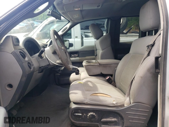 2006 Ford F-150 XLT with VIN 1FTPX14546FA32199, listed as a Copart auction lot 56480645 with 161,520 mi miles and Salvage title. Bid and sale history available at DreamBid. Image 7.