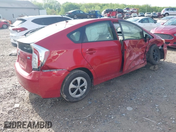2015 Toyota Prius Four with VIN JTDKN3DU2F1899150, listed as a IAAI auction lot 42143825 with 199,405 mi miles and . Bid and sale history available at DreamBid. Image 4.