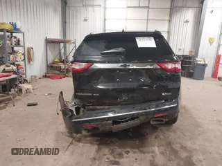 2018 Chevrolet Traverse Premier z VIN 1GNEVJKW6JJ179467, wystawiony jako IAAI lot #41214356 z przebiegiem 93 931 mil mil oraz . Historia ofert i sprzedaży dostępna na DreamBid. Obrazek 16.