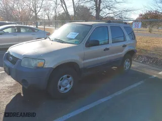 2007 Ford Escape XLS Value with VIN 1FMYU92Z77KA40397, listed as a IAAI auction lot 40768784 with 112,097 mi miles. Bid and sale history available at carsss.com. Image 2.