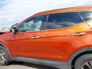 2014 Hyundai Santa Fe z VIN 5XYZUDLB4EG138898, wystawiony jako IAAI lot #42196491 z przebiegiem Nie podano mil oraz . Historia ofert i sprzedaży dostępna na DreamBid. Obrazek 14.