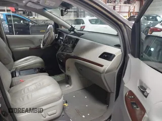 2013 Toyota Sienna XLE AAS with VIN 5TDYK3DC5DS355798, listed as a IAAI auction lot 41884055 with 135,032 mi miles. Bid and sale history available at carsss.com. Image 5.
